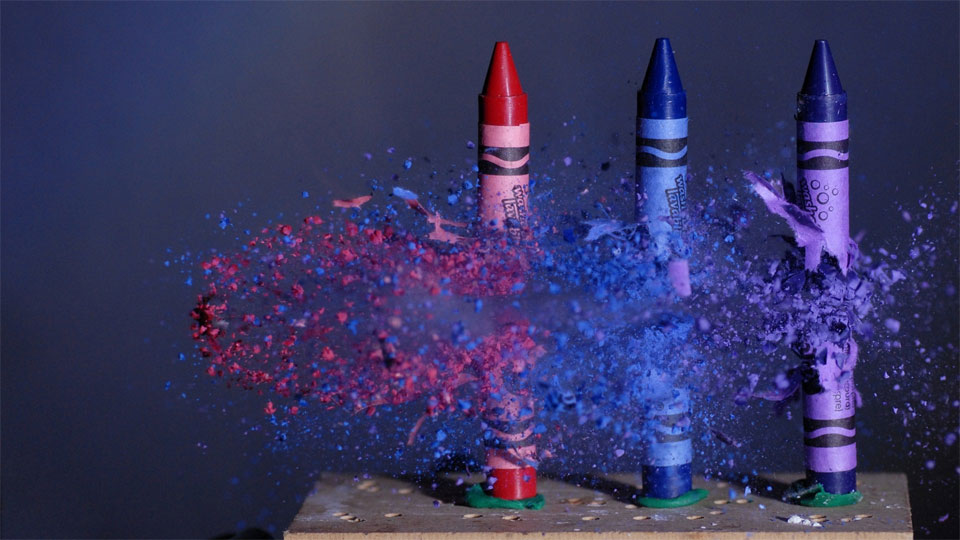 bullet through crayons, high speed photo