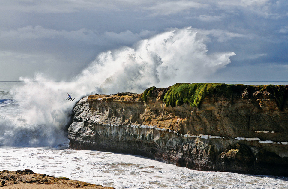 surfer cliff jump