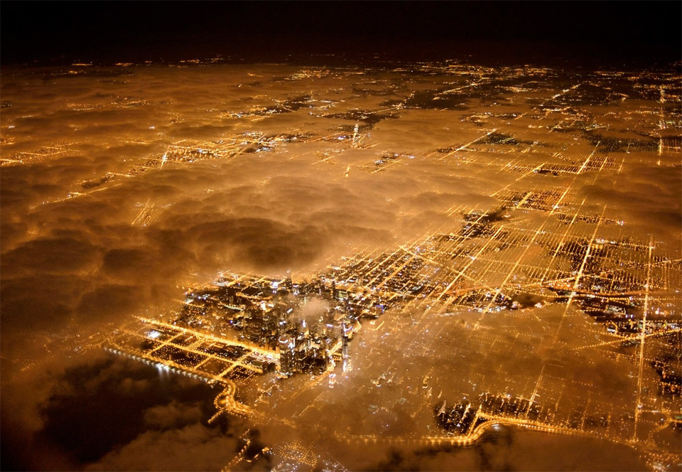 aerial of chicago at night with fog