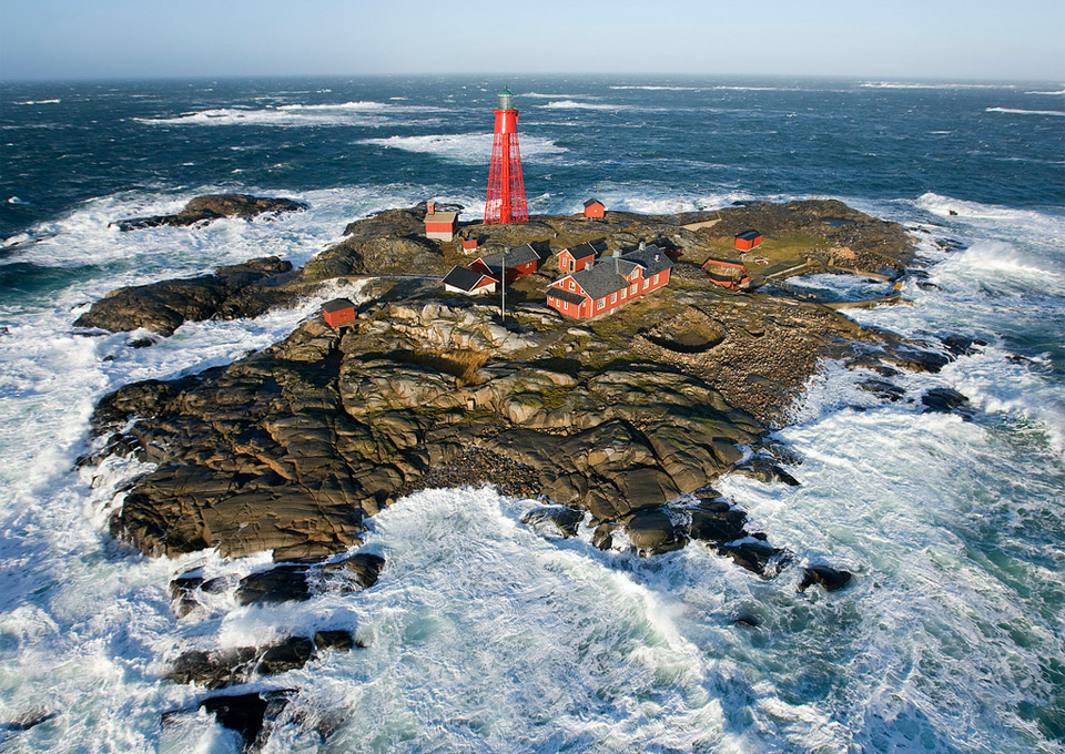 lighthouse island at winter storm
