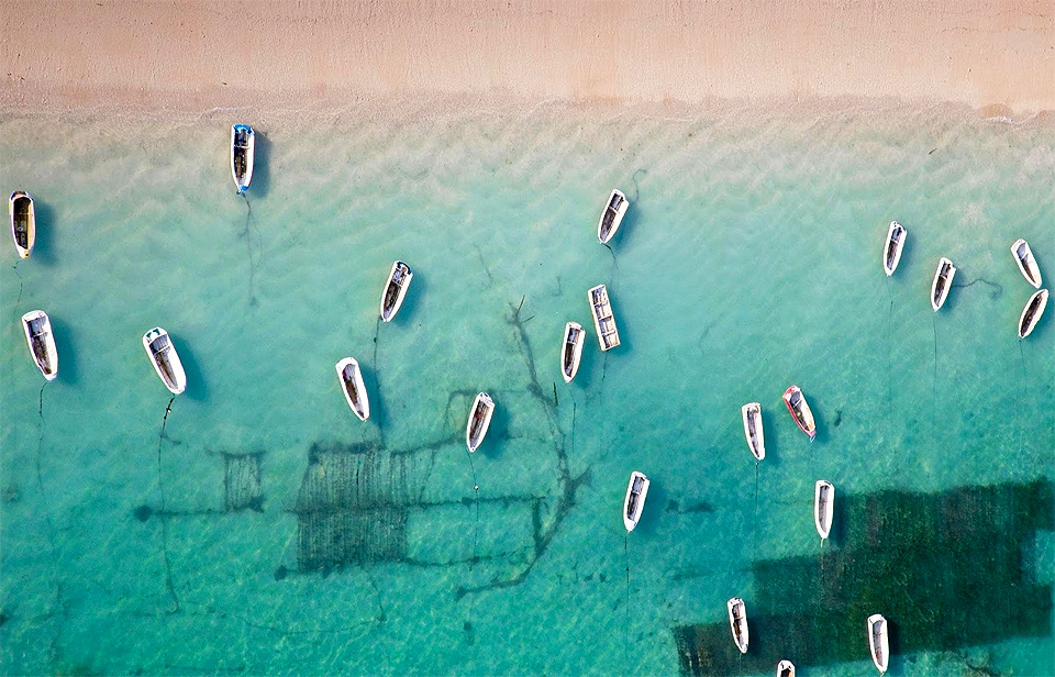rowboats near bali, indonesia
