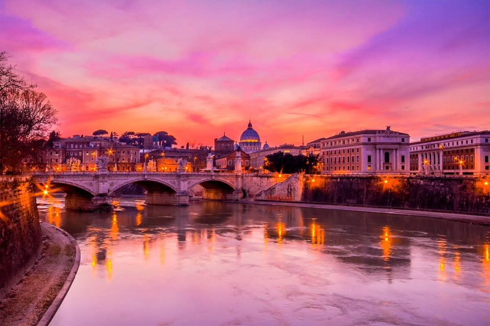 the urban landscape of rome with a amazing sunset