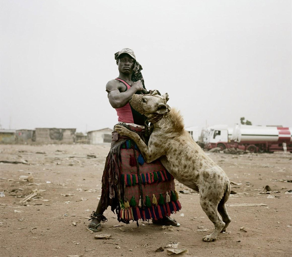 a man with his pet hyena