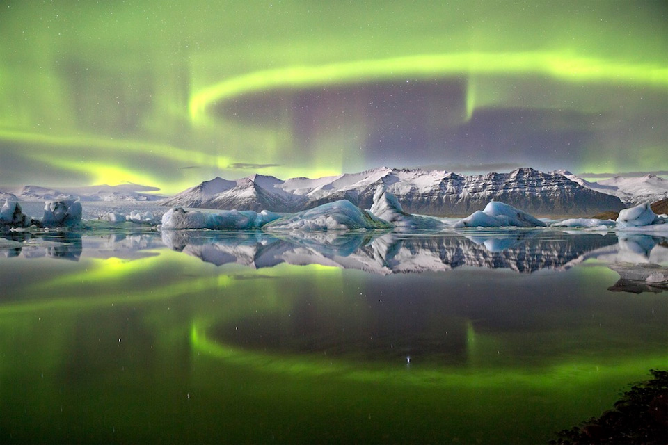 aurora over a glacier lagoon, iceland