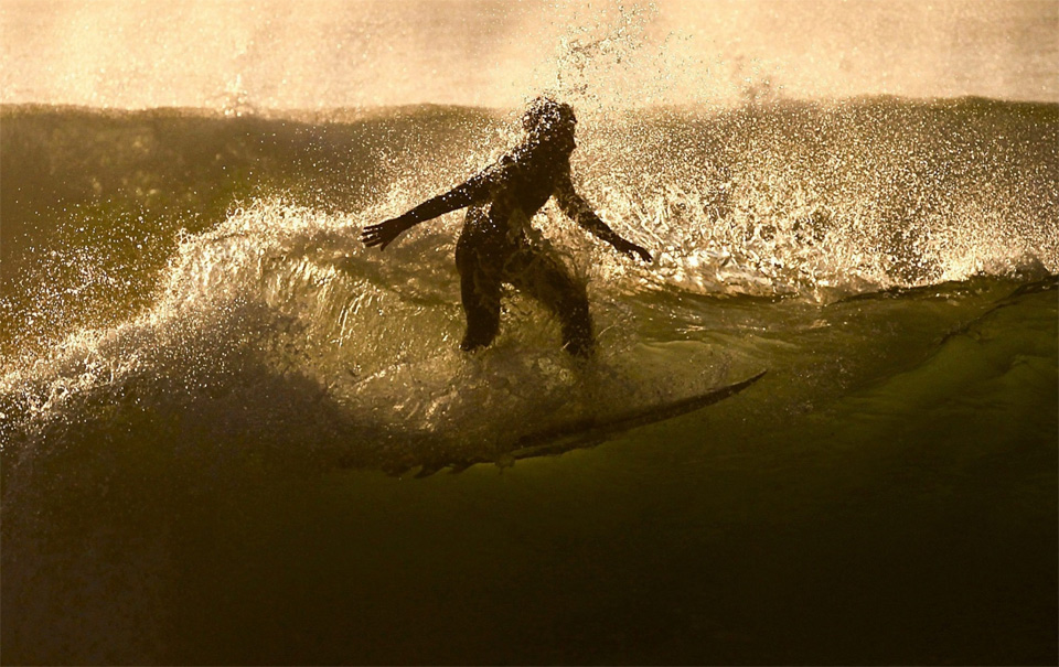 Surfer Rides A Wave, Spain