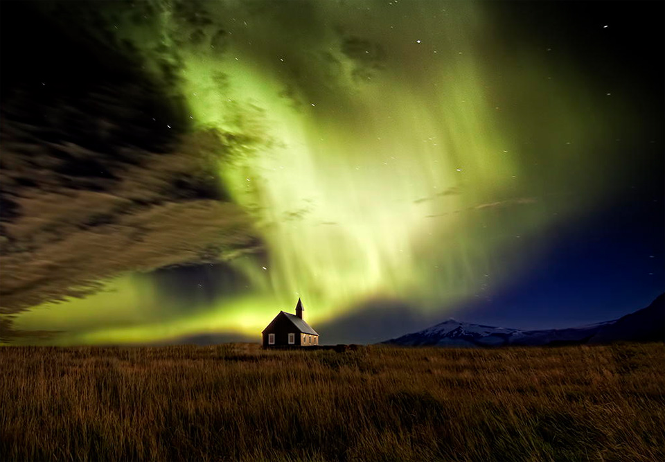 Solar Flare Over Small Church In Iceland