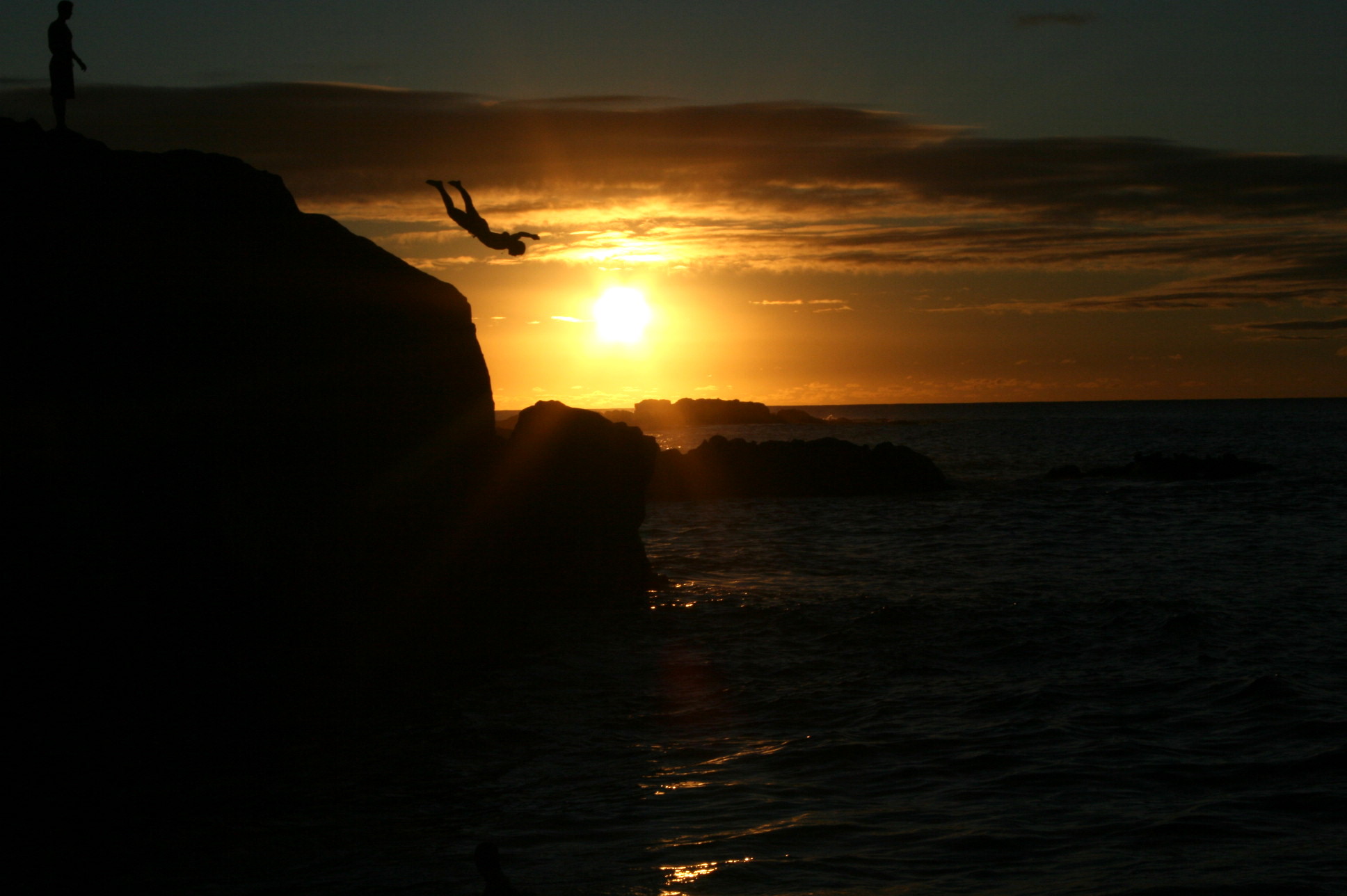 jumping into sunset