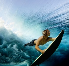 surfing under the waves