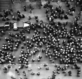 overhead view of men wearing hats, nyc, 1930
