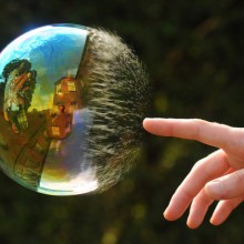 reflection in popping bubble