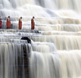 monks at pongour falls