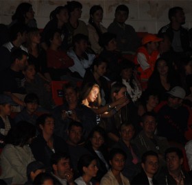 girl taking a photo of herself at concert