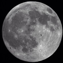 international space station passing the moon