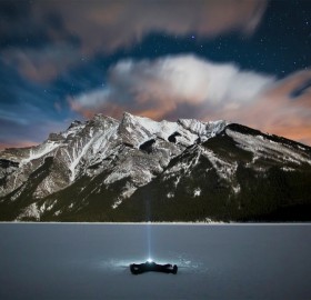 frozen lake minnewanka at night, canada
