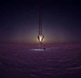 scientists working on a tower in antarctica