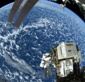 astronaut takes spacewalk