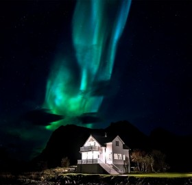 aurora borealis over house, norway
