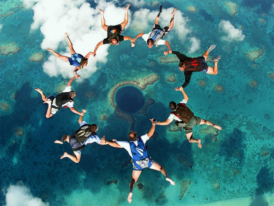 skydiving over the great blue hole, belize