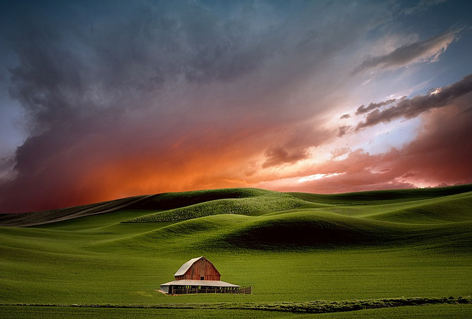 farmhouse in red sunset