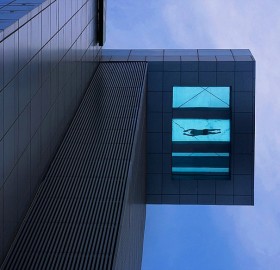 glass bottom swimming pool at 24th floor