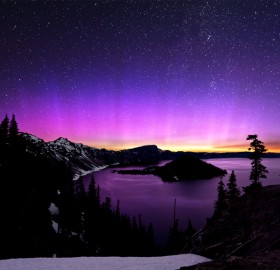 aurora borealis and the milky way over crater lake