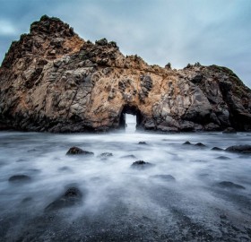 natural doorway, big sur beach, california
