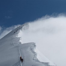 climbing to a cold and windy weissmies