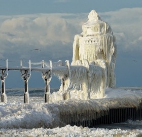 winter hits st. joseph lighthouse, michigan lake