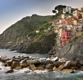 a village on cliff, riomaggiore, italy